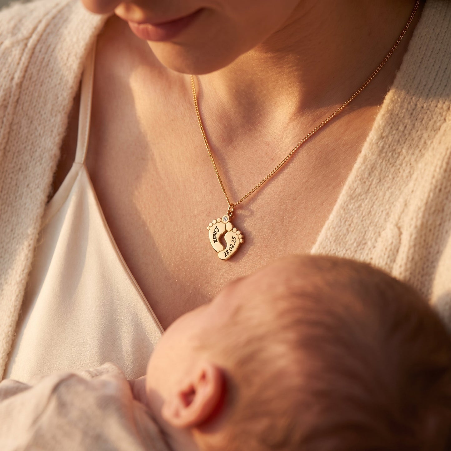 Ketting met babyvoetjes en gravure
