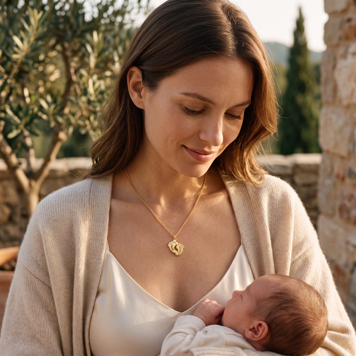 Ketting met babyvoetjes en gravure